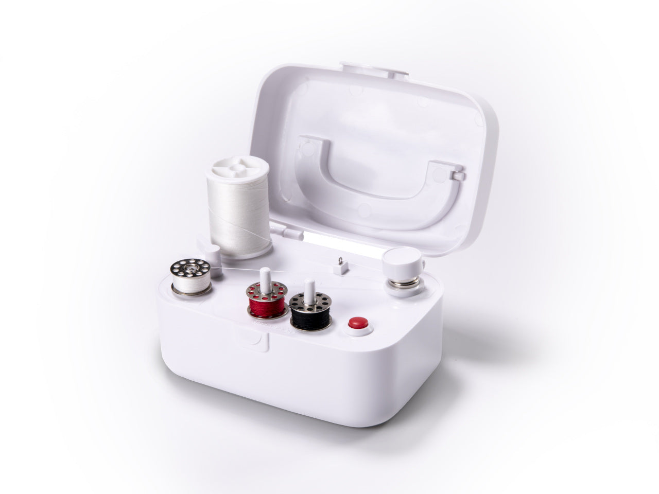 White SINGER bobbin winder box with one reel of white thread and three threaded bobbins