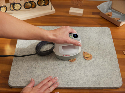 singer-momento-mini-press-putting-vinyl-on-earrings