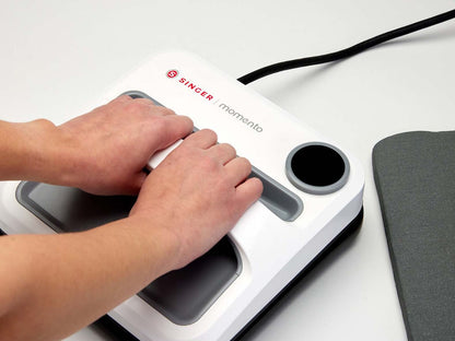 220453104-momento-square-press-in-use