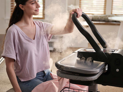 lady-using-the-esp36-steam-press-stand