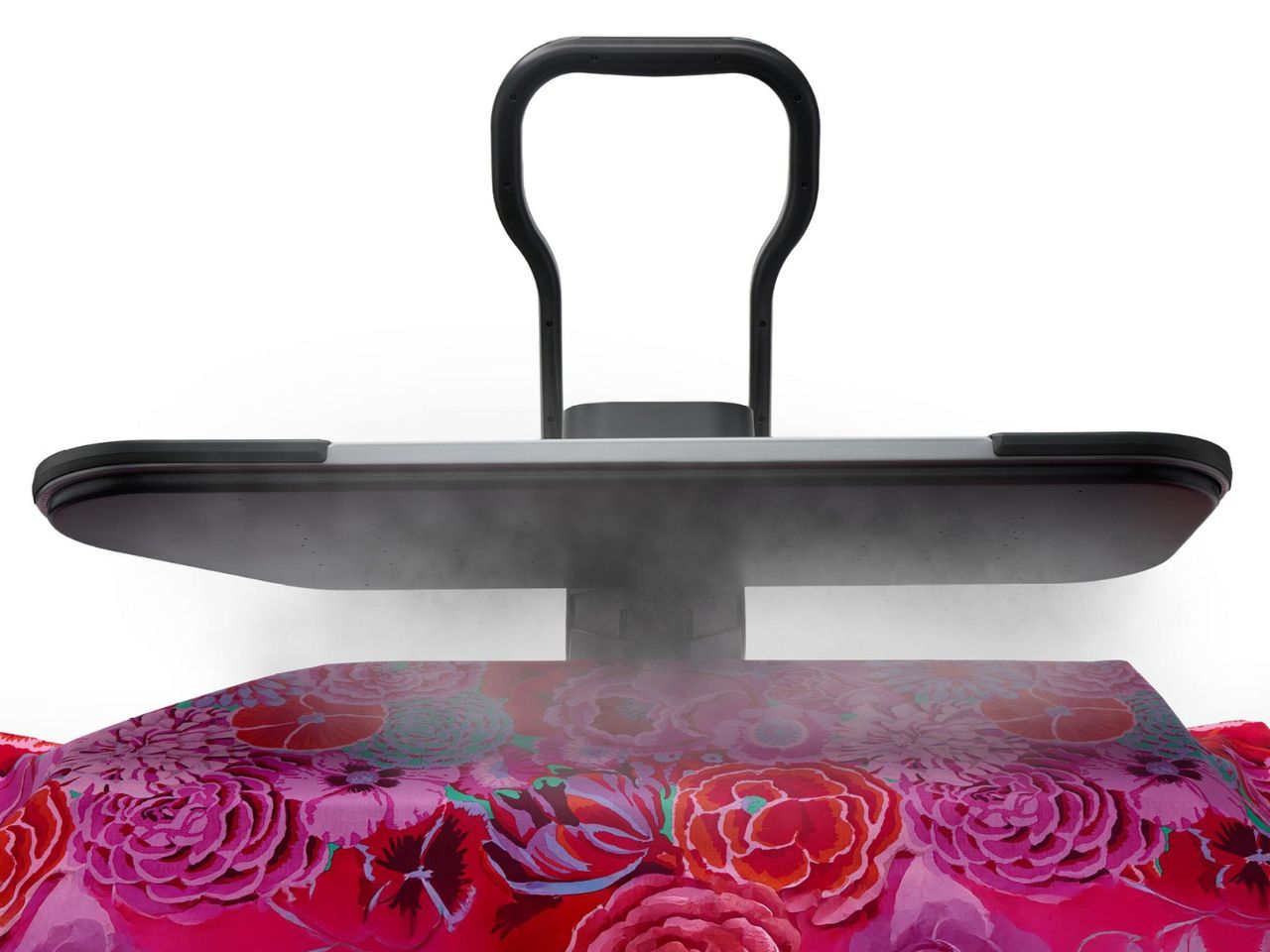 singer-esp36-new-design-steaming-a-floral-tablecloth